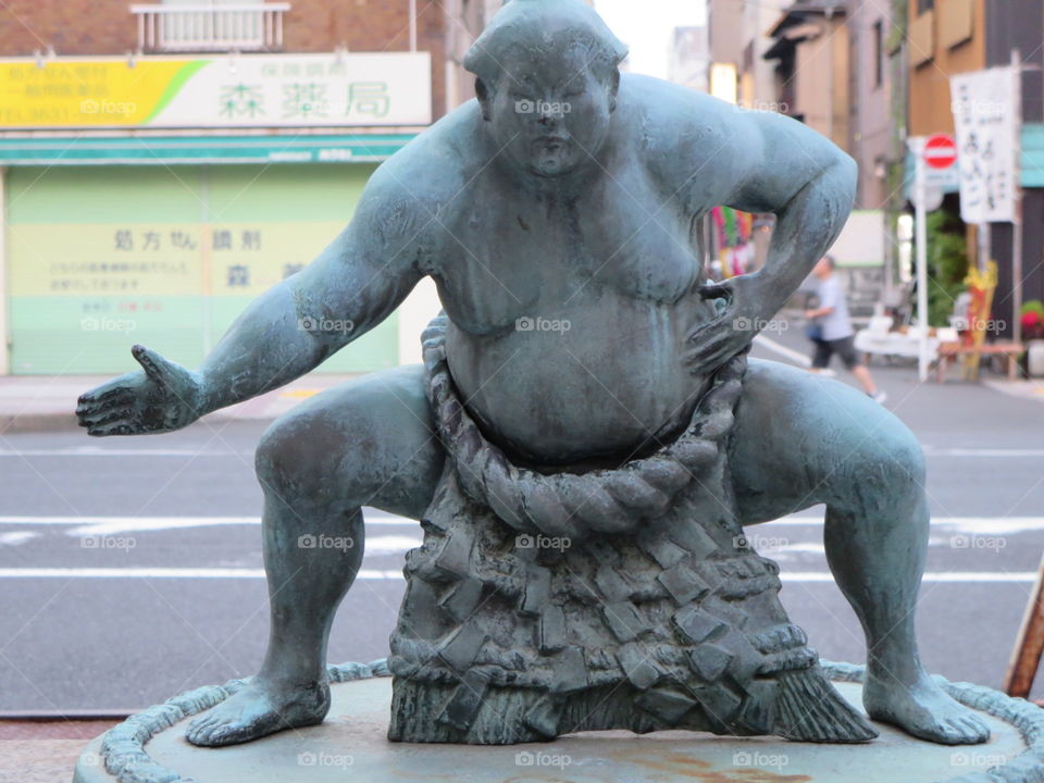 The meaningful  japanese traditional and cultural beliefs ..
The statu of great wrestler which is called "Sumo" in japanese..
By japanese rod I take this meaningful statu picture...