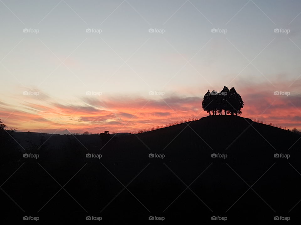 Hill silhouette at sunset, Italy