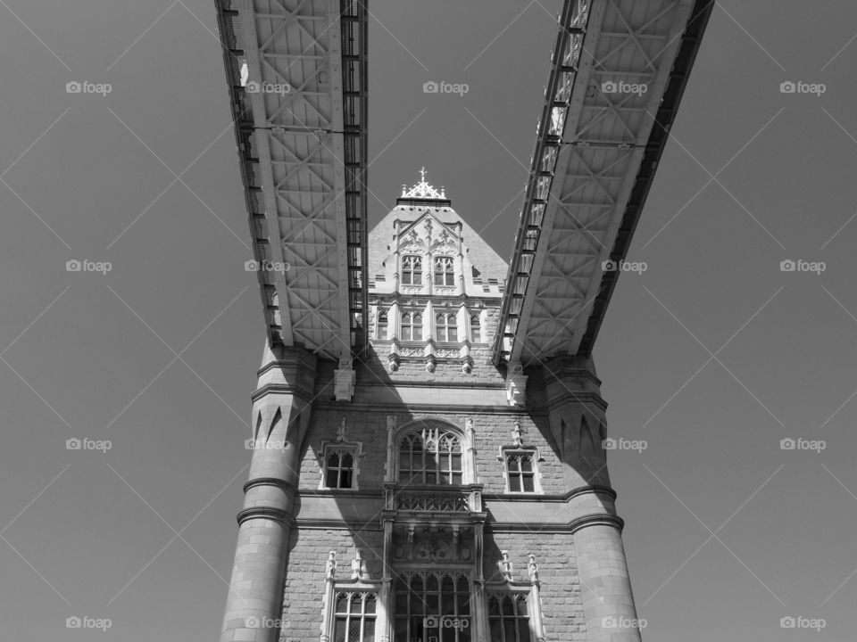 Fine architectural details of Tower Bridge in London, England on a sunny summer day. 