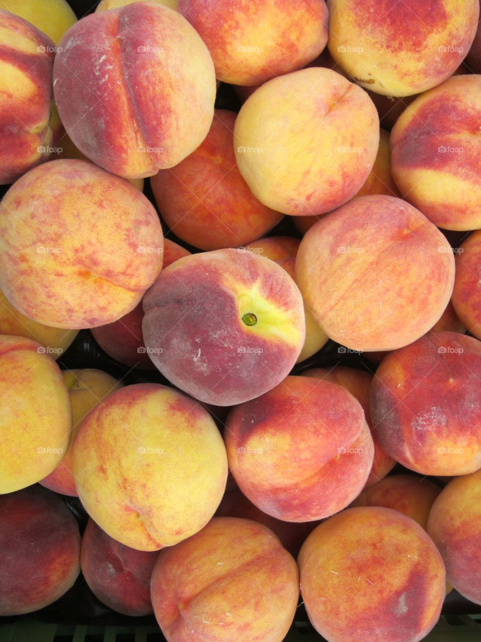 Full frame of peaches