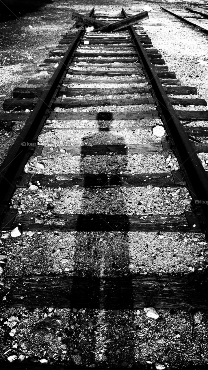 Shadow on the Train Tracks