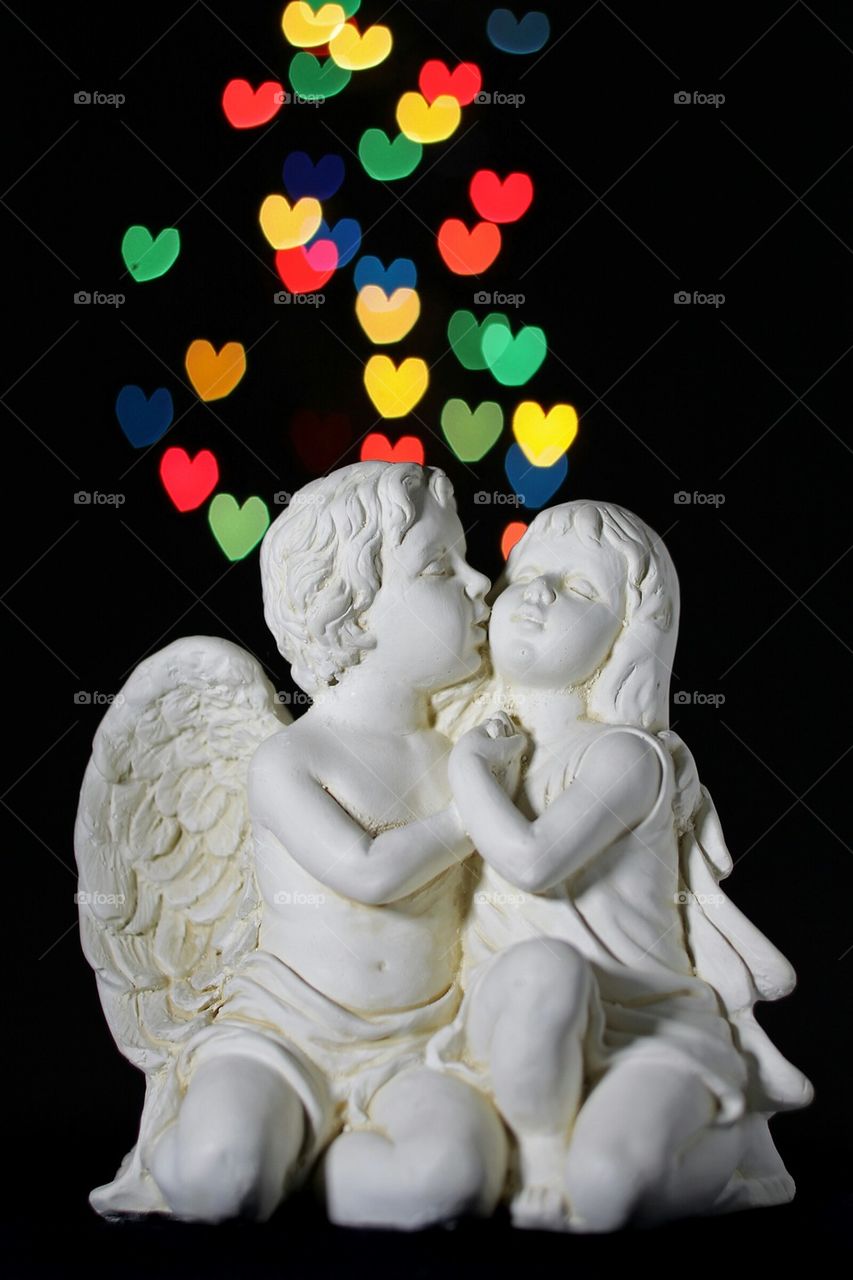 Little angels kissing