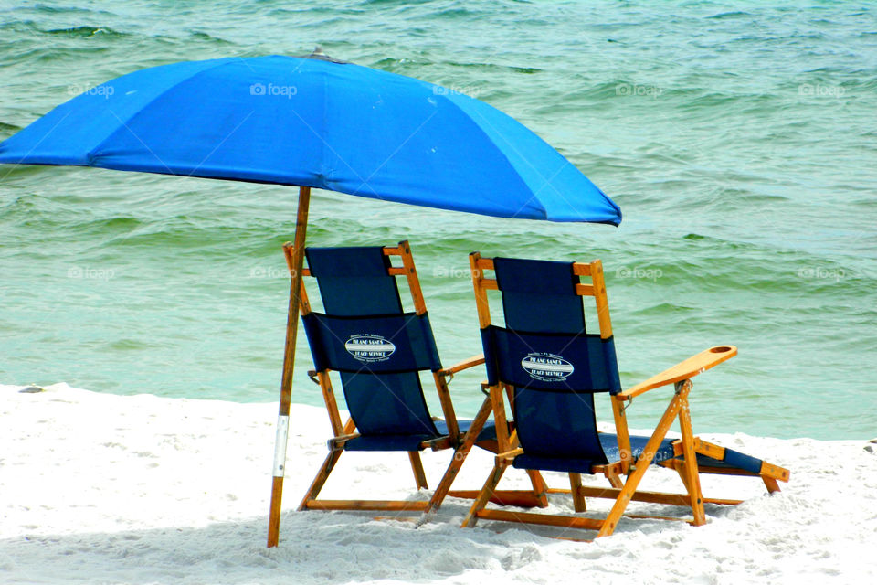 Beach chairs awaiting the arrival of the beach goers! Water, Water, everywhere! I just happen to be fortunate enough to live in a state that has approximately 12,000 square miles of beautiful, refreshing, colorful oceans, rivers, lakes, ponds and swamps!