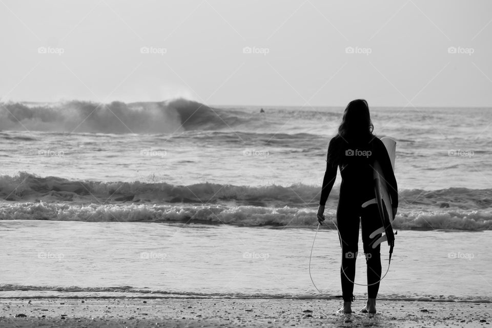 Surfer girl and her board 