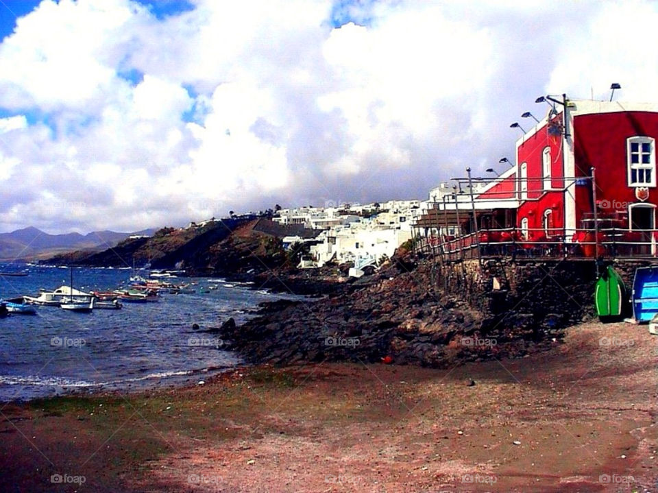 beach travel boats buildings by merethe