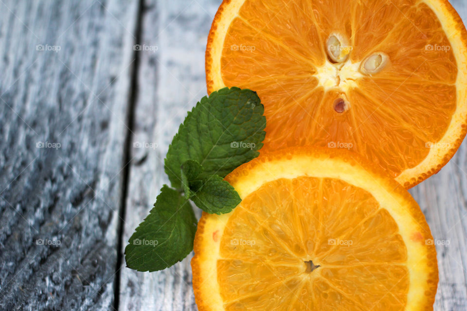 Orange fruits slice on table