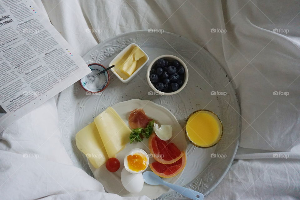 breakfast and the News in bed