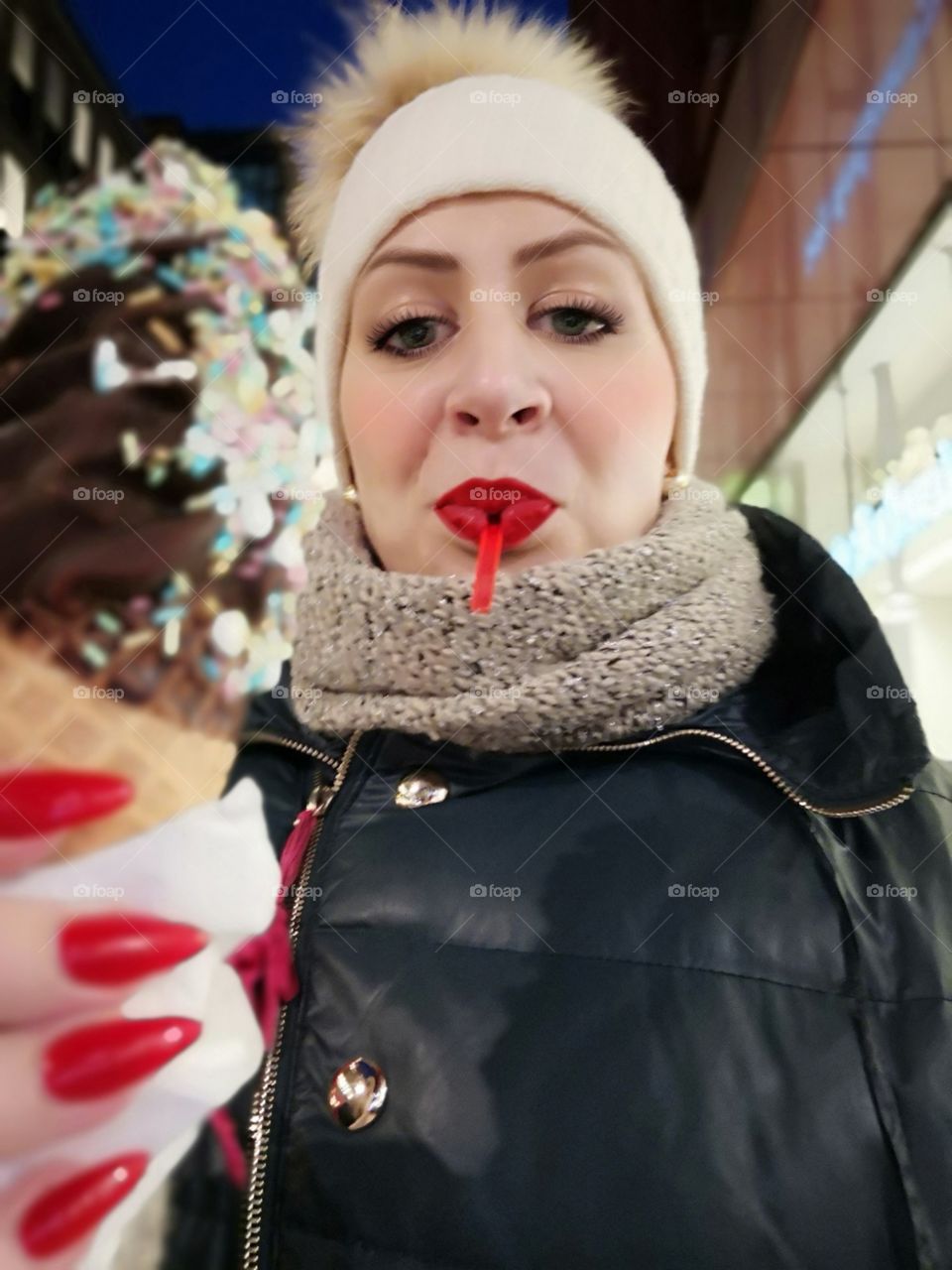 A portrait of a girl with ice-cream.