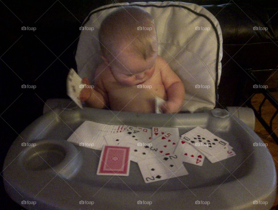 Baby playing cards