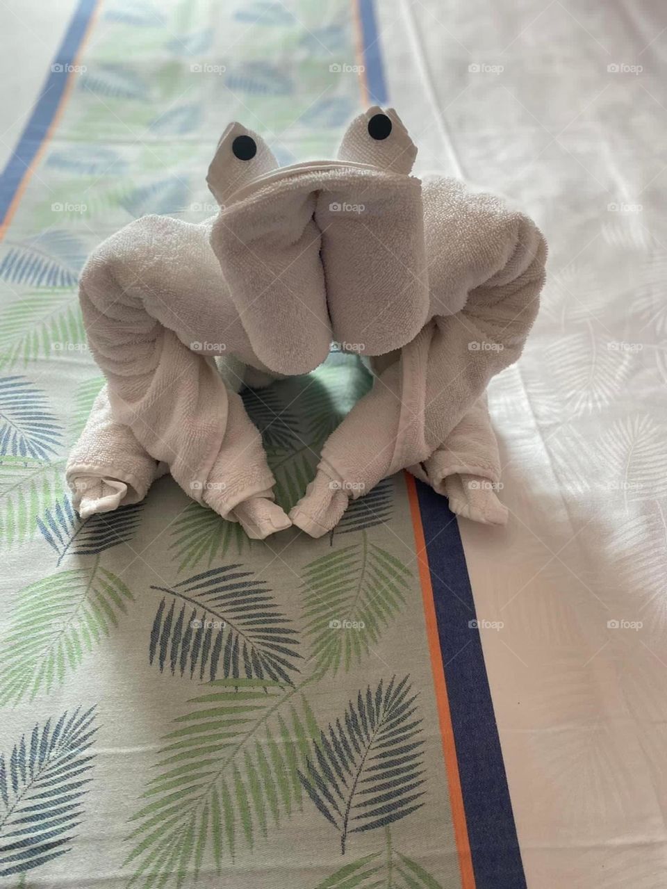 A crab is made of towels on a cruise ship. Towel art is a fun way to be welcomed back to one’s room. 