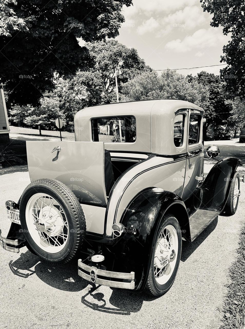 Bold car parked by the street