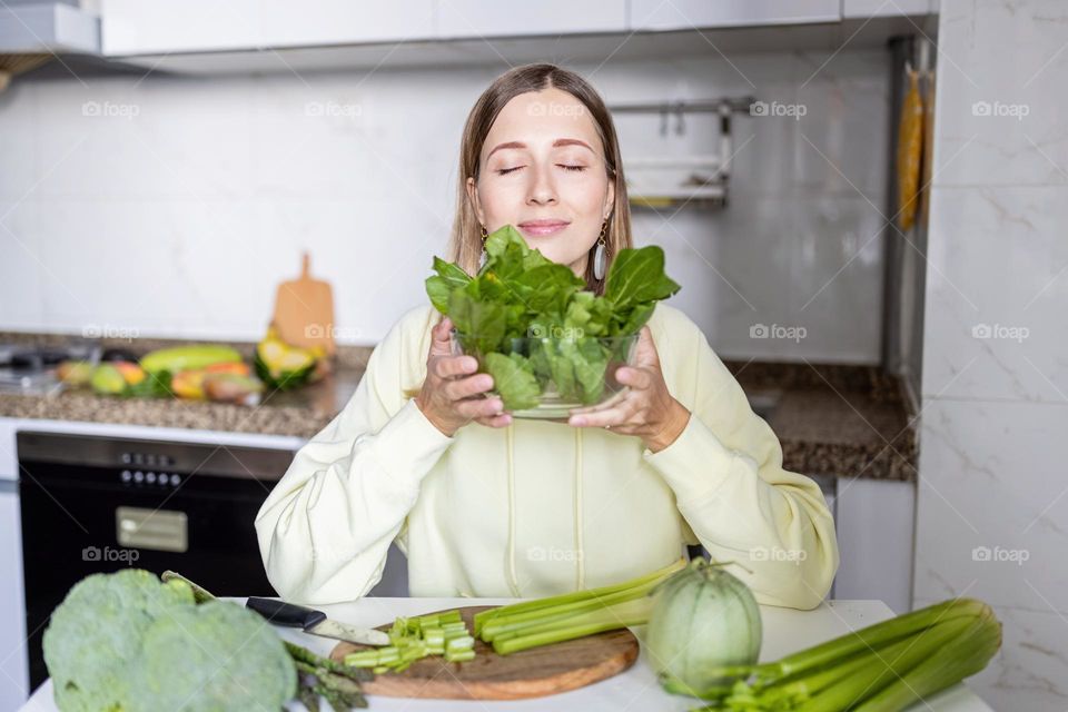 Woman with fresh vegetables 