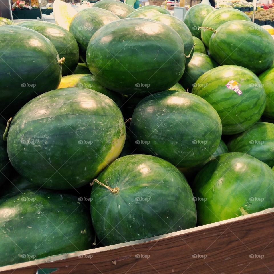 Pile of watermelons at supermarket
