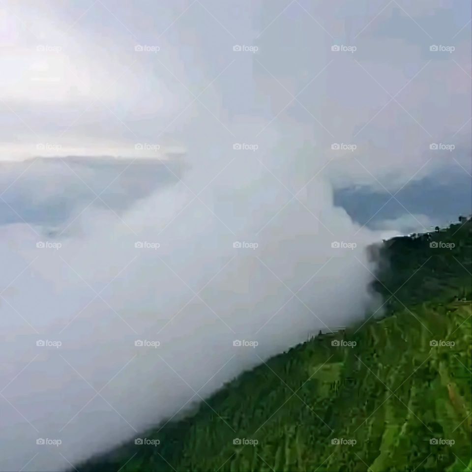 Glory be to God, the magnificent and picturesque view and the natural green trees are a view that is nothing more wonderful than it