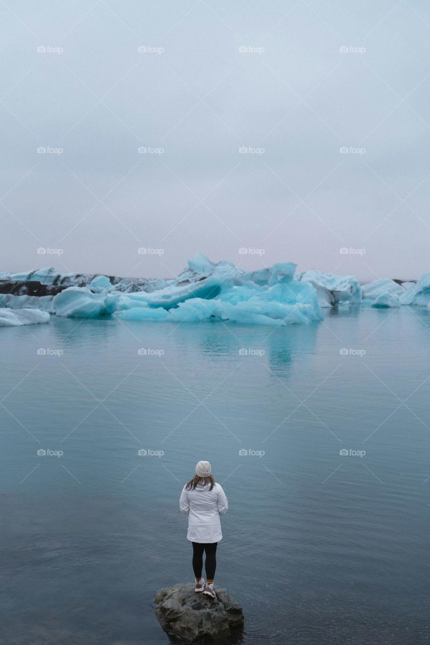 a person standing on a rock in the water

speechless
