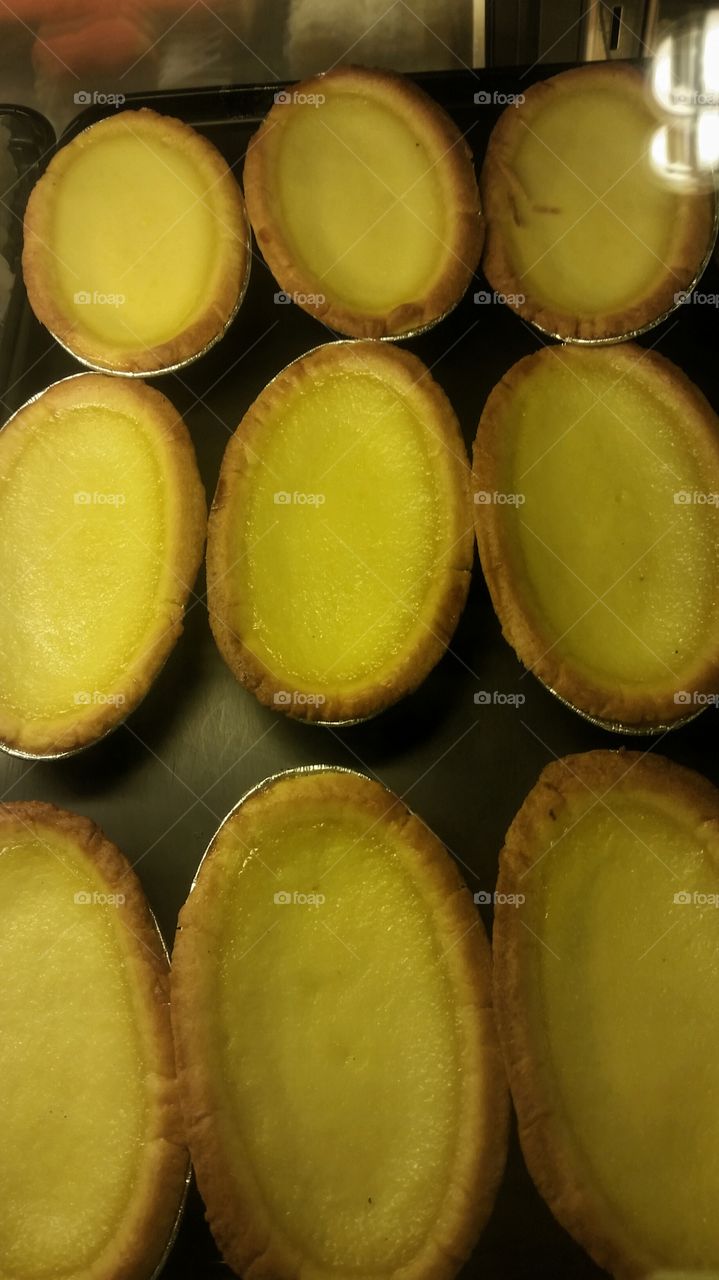 yummy egg tarts. fresh from the oven and put on sale