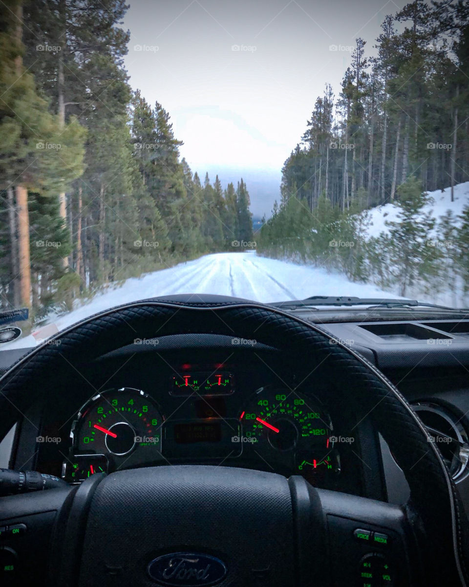Drive on a mountain pass covered in snow.