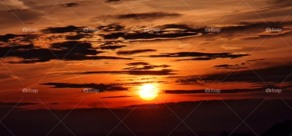 First minutes od sun rising over horizon