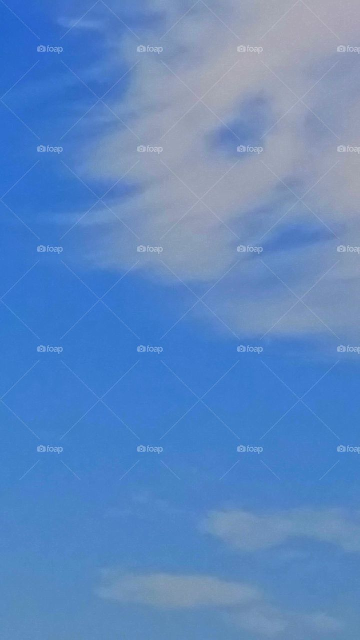 A Face In The Clouds. A beautiful summer day at Encinitas beach.