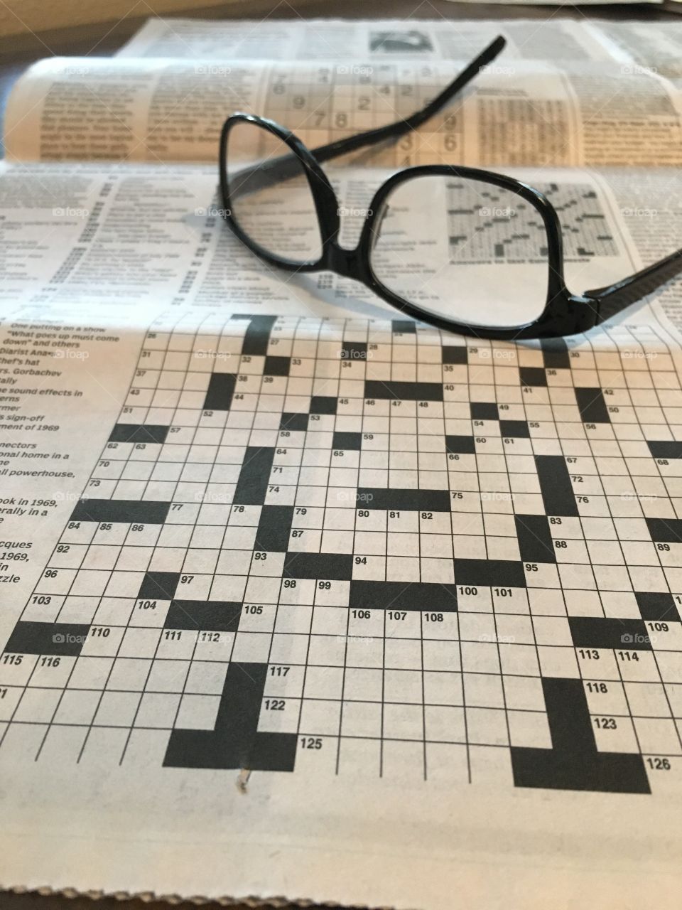 Crossword puzzle & glasses