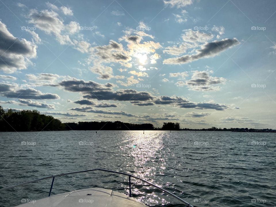 Clouds and sun make a spectacular view coming in from the lake. 