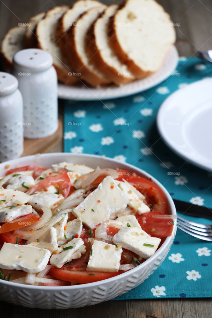 Tomatoes and Cheese salad with freshly baked bread