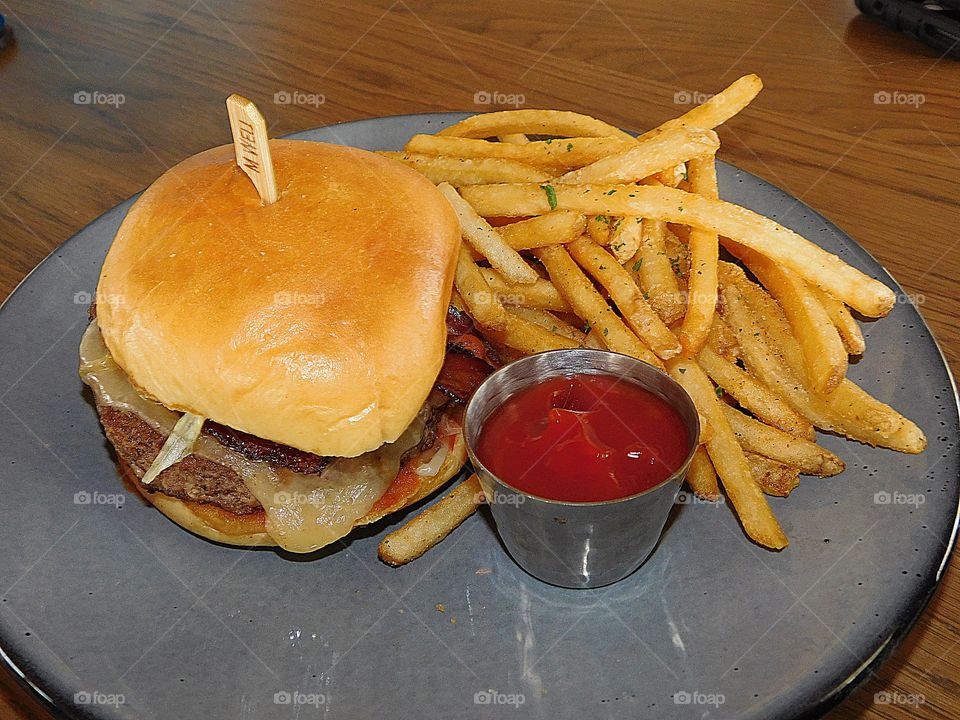 Favorite sandwich- cheeseburger, ketchup and fries 