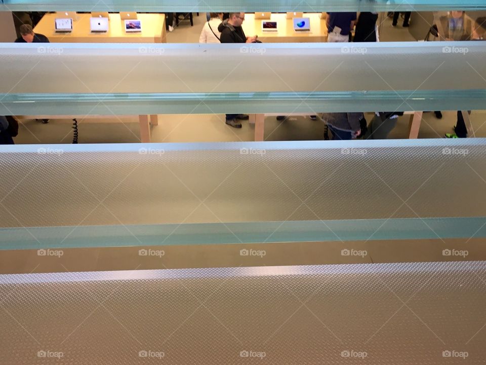 Glass staircase in a computer store