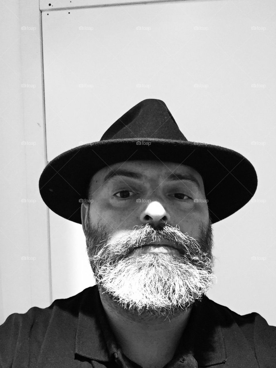 Man with beard wearing hat