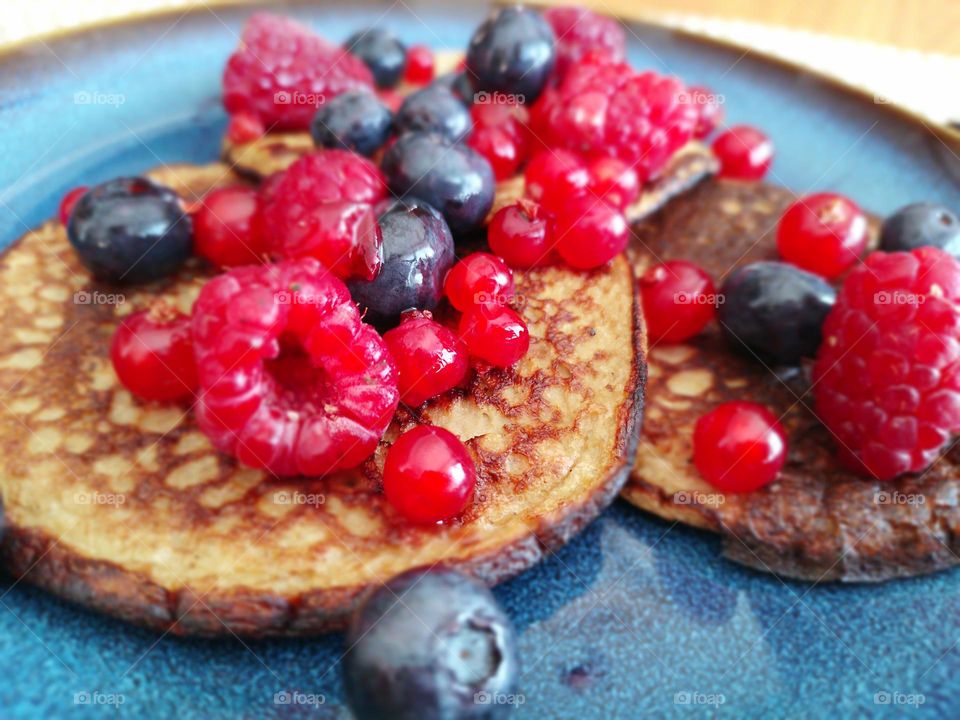 Delicious banana pancakes with fruits