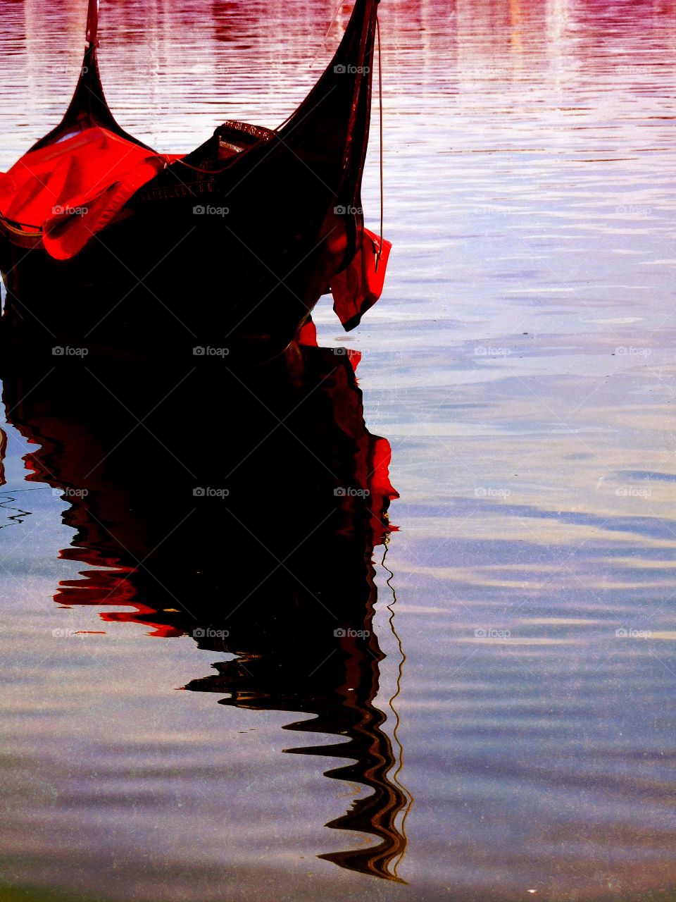 Gondola with red reflection 