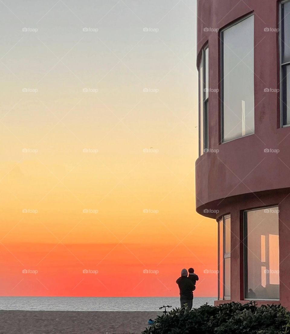 Father and son in the sunset