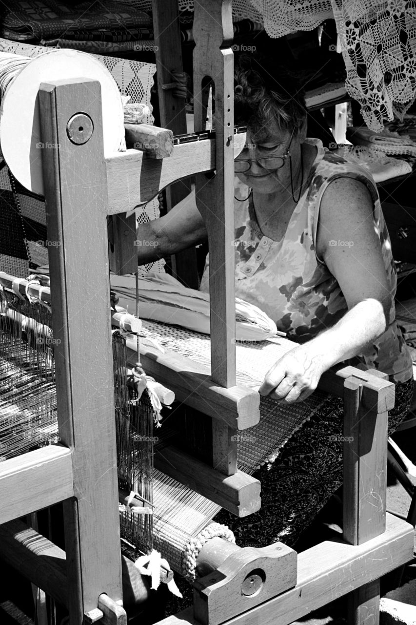 Senior woman working in factory