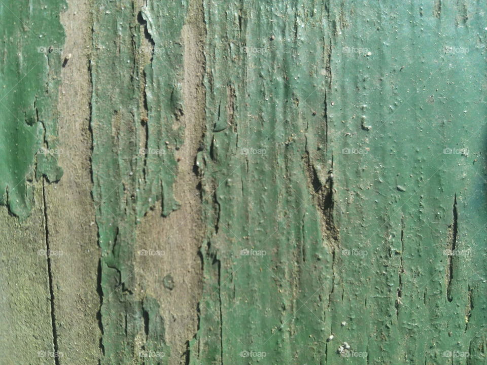 Texture of an old green wooden casket