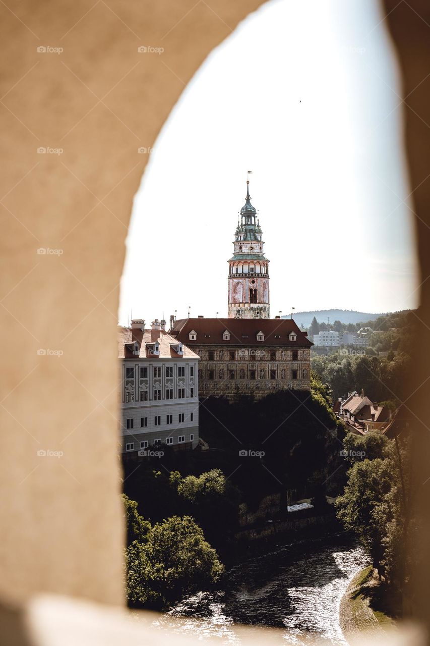 Looking through a window at the tower