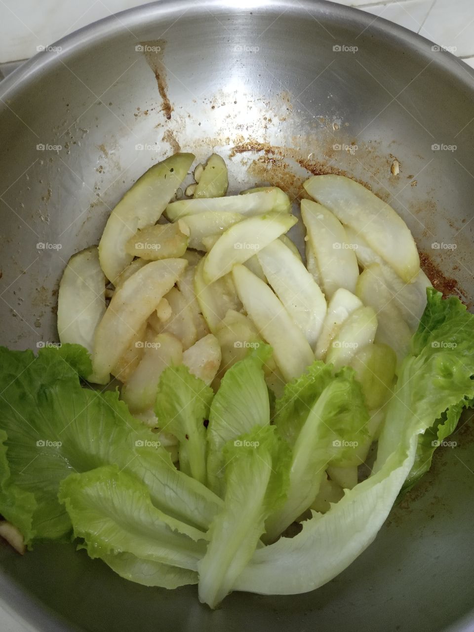 stir  fry hairy melon with fresh lettuce