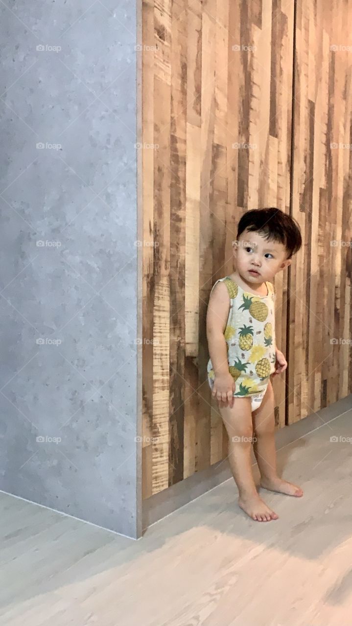Asian baby boy model with sleeveless tee shirt and nappy 