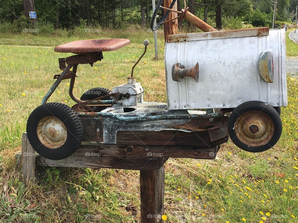 Funny homemade mailbox looking like a tractor