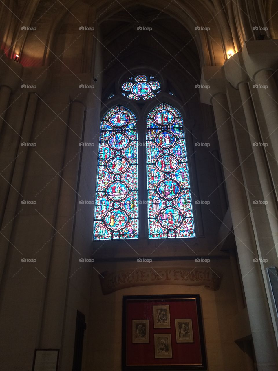 Mosaic window in old Catholic Church of Janna D’ark in Marcelle, France