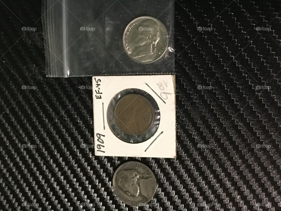 1909 penny, silver nickel,and a 1962 gem bu nickel