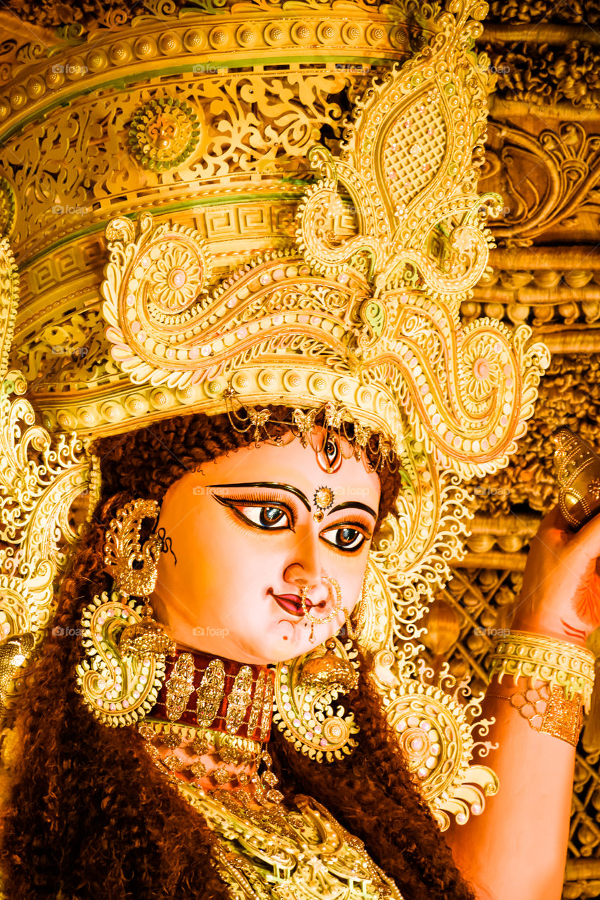 Chandannagar, West Bengal, India - November 16, 2018: Portrait of Hindu Goddess Jagadhatri Idol during Jagadhatri Puja celebration. It is a popular festival Bengali people celebrated for four days.