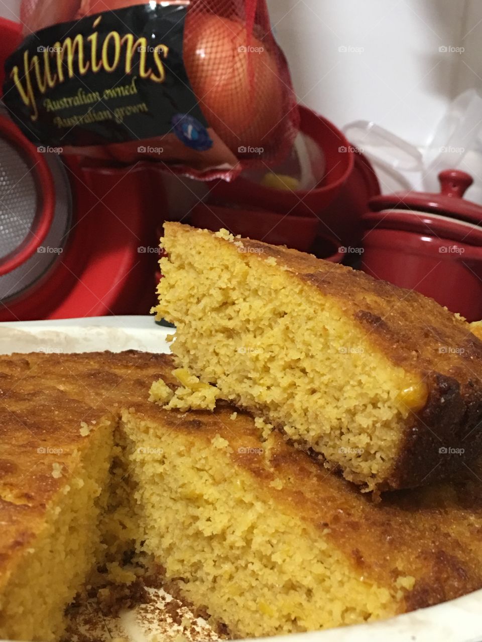What's cooking? Homemade cornbread, southern style a traditional favourite shown here in a round among pan with a wedge removed and sitting atop the pan