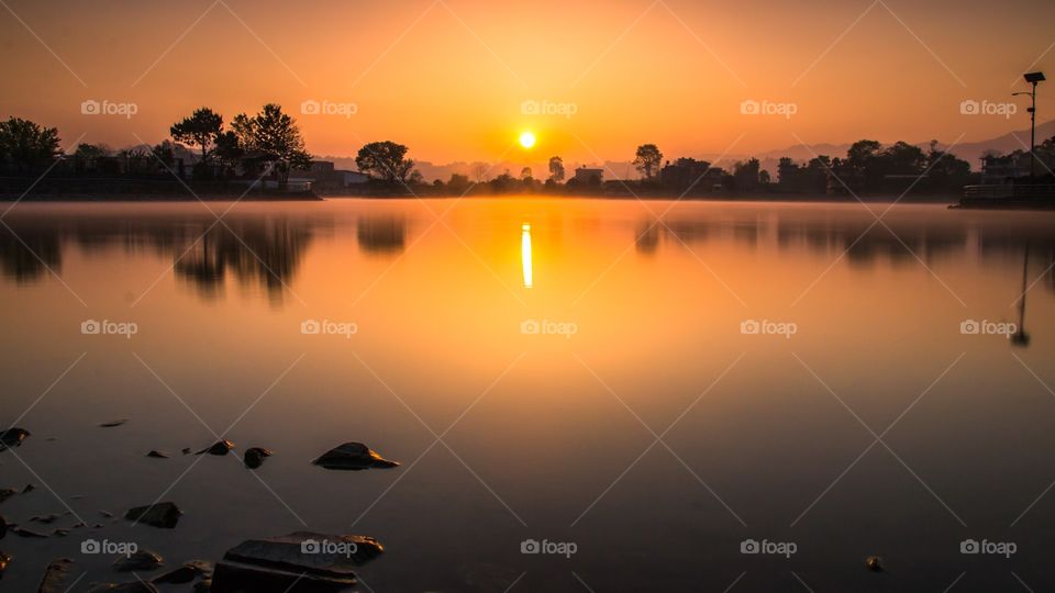 Sunrise at Taudah Lake, Kathmandu, Nepal.