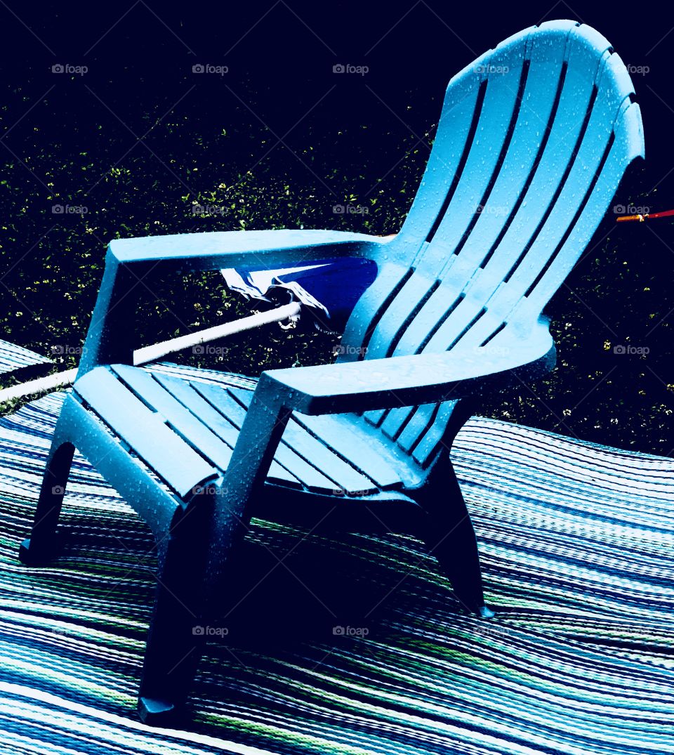 Summer chair in the rain