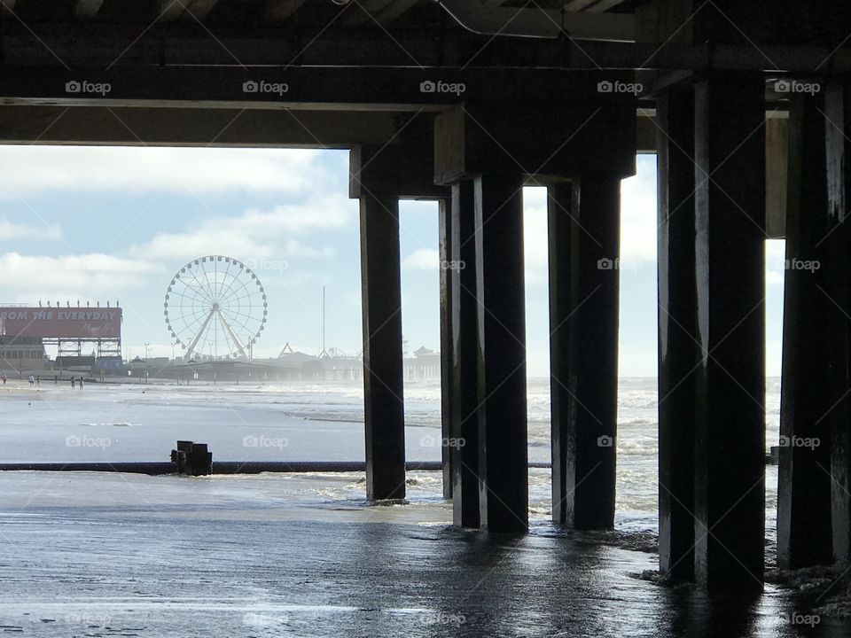 Ferris wheel under the pier