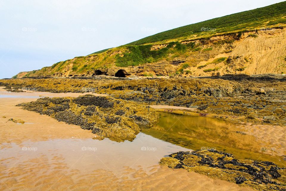 Rock face reflected in a Rock pool