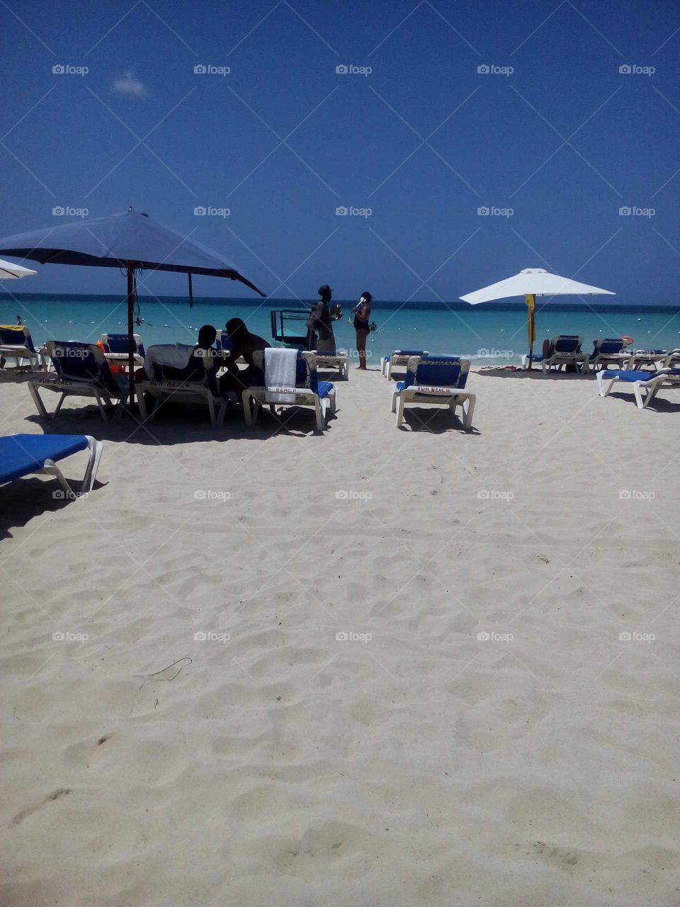 a day at the beach was a lot of fun we play in the sand and we also make sand castle.