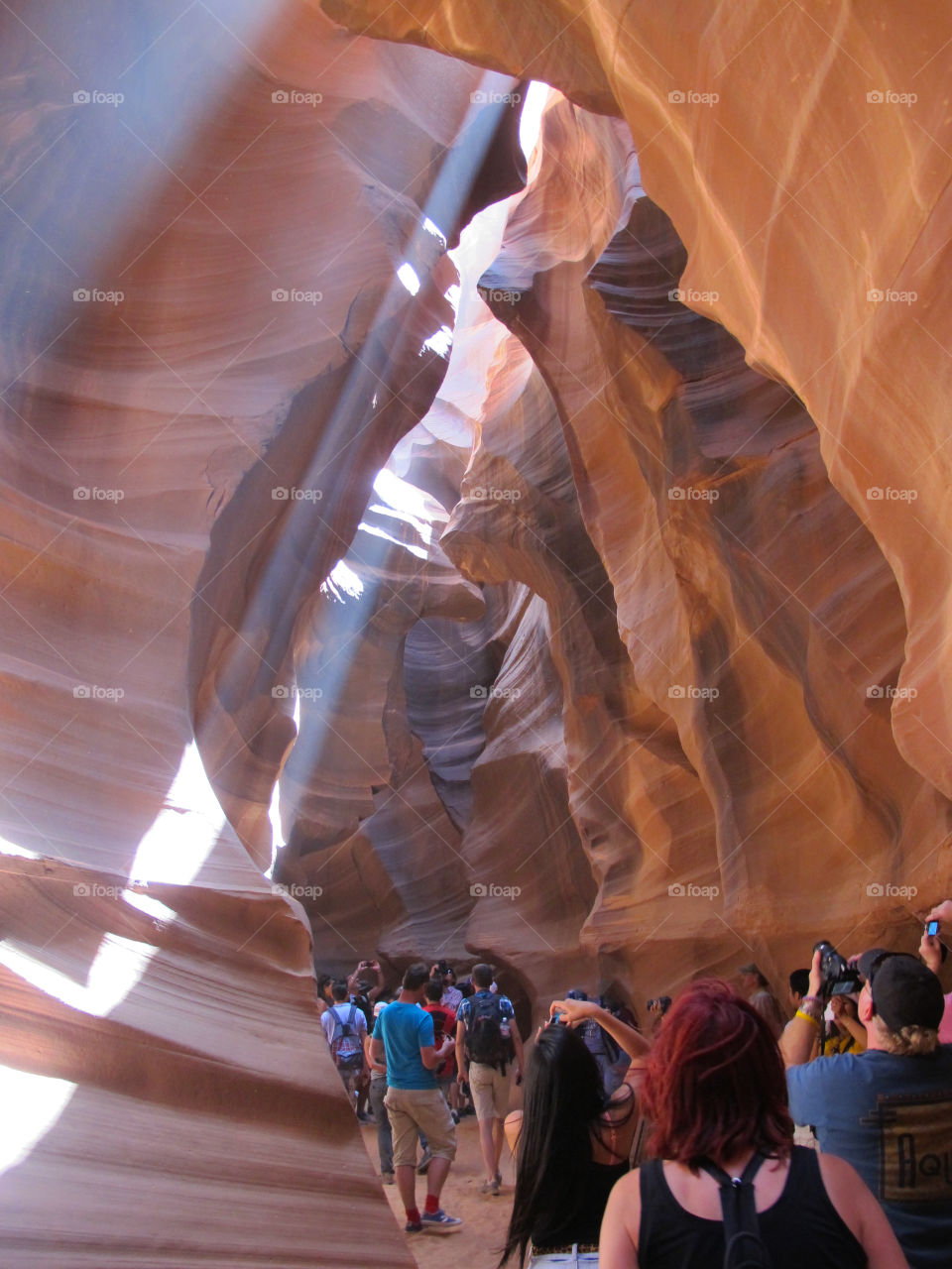 People taking photos of majestic Antelope Canyon