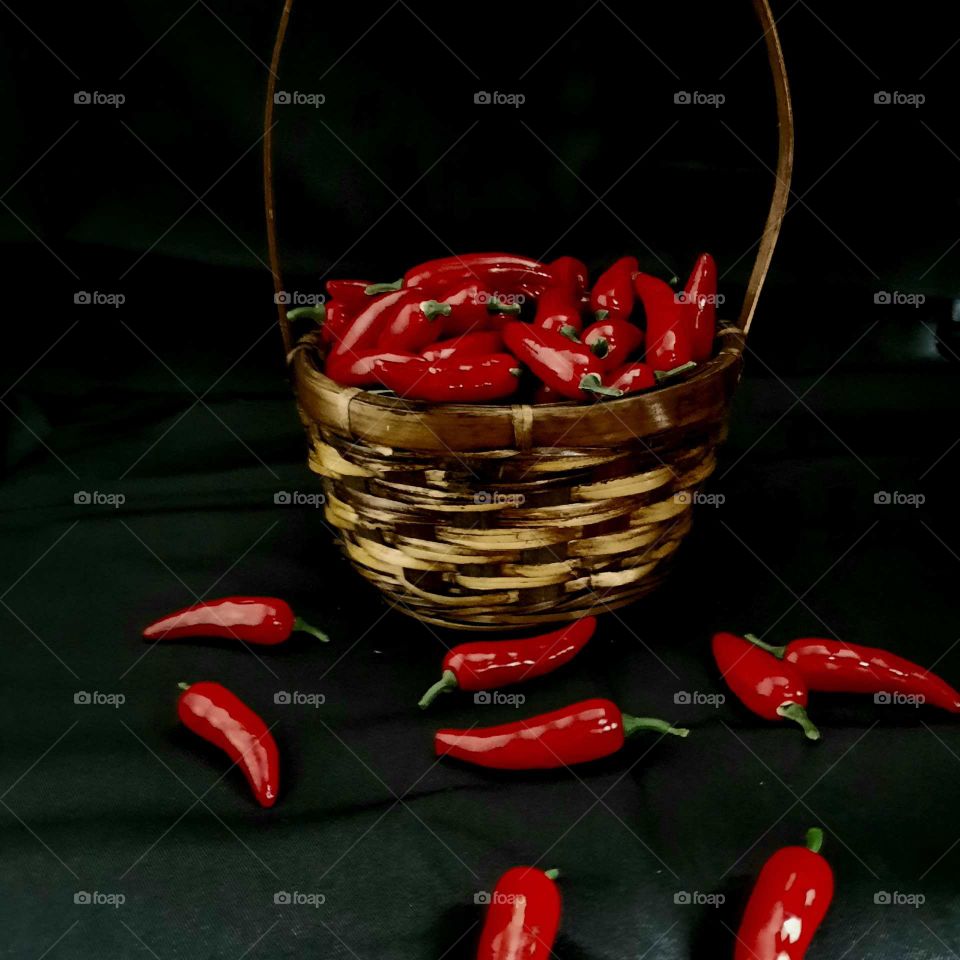 Collection of Red Peppers in a Basket