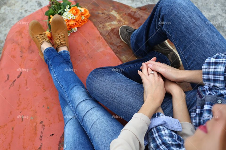 Couple holding hands